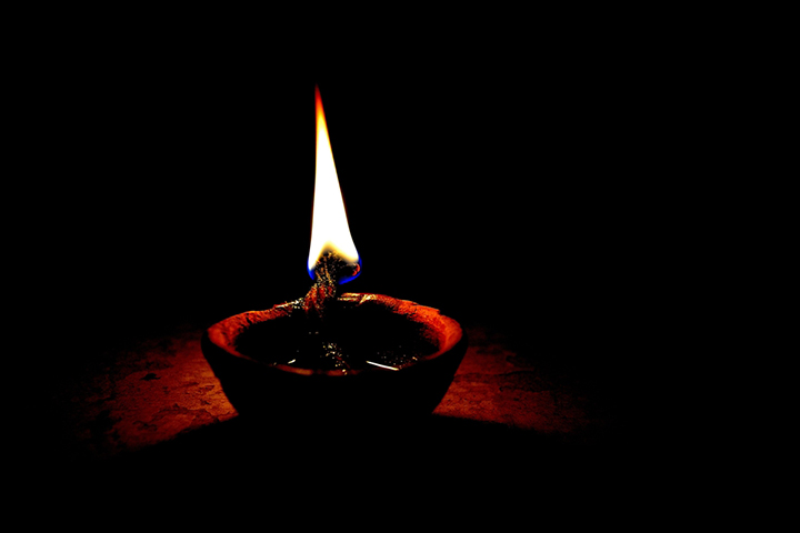 An earthen lamp is used to make kajal at home