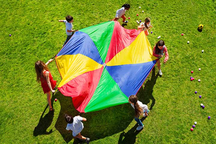 Dance activities for kids with a parachute