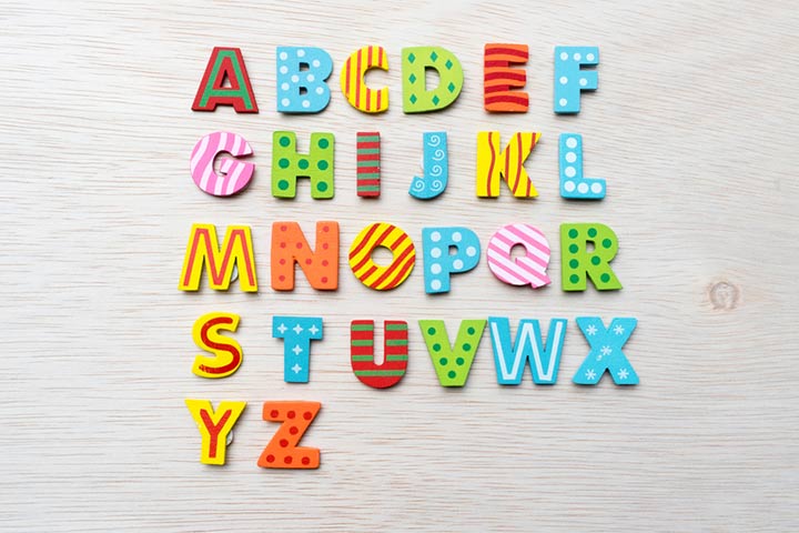 Alphabet wood carving, baby shower guestbook ideas