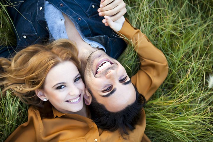 Lie down with heads together couple photo pose ideas