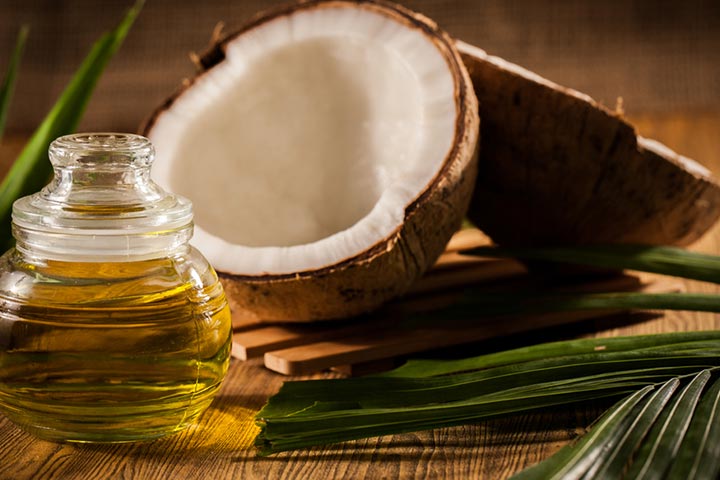 Coconut oil enhances hair lubrication and prevents breakage.