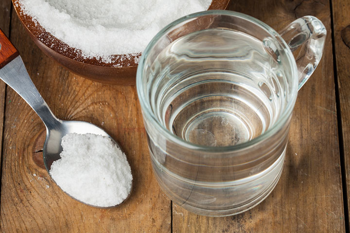 Saline enema is made at home by mixing table salt and tap water